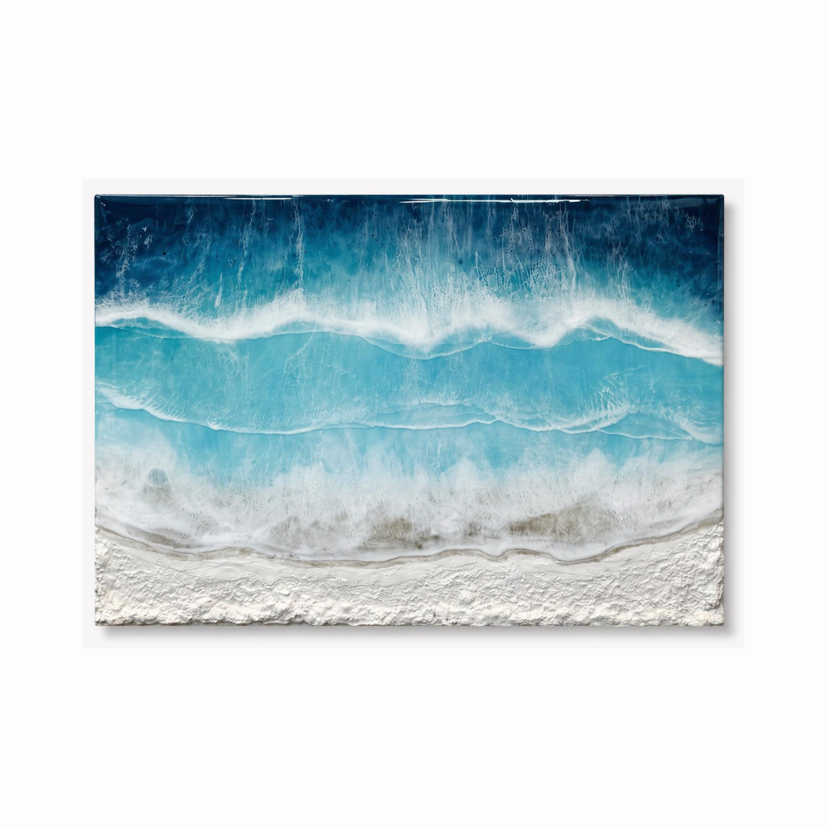 Large textured ocean wall art with layered blue waves and sandy shoreline